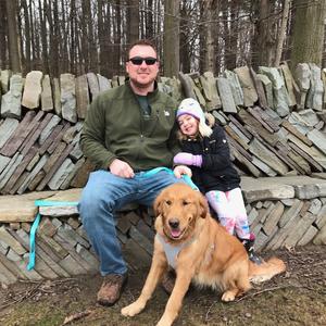 Jake, his daughter Harper and dog Molly visit the MacFarlane Trail at Zenda Farms Preserve
